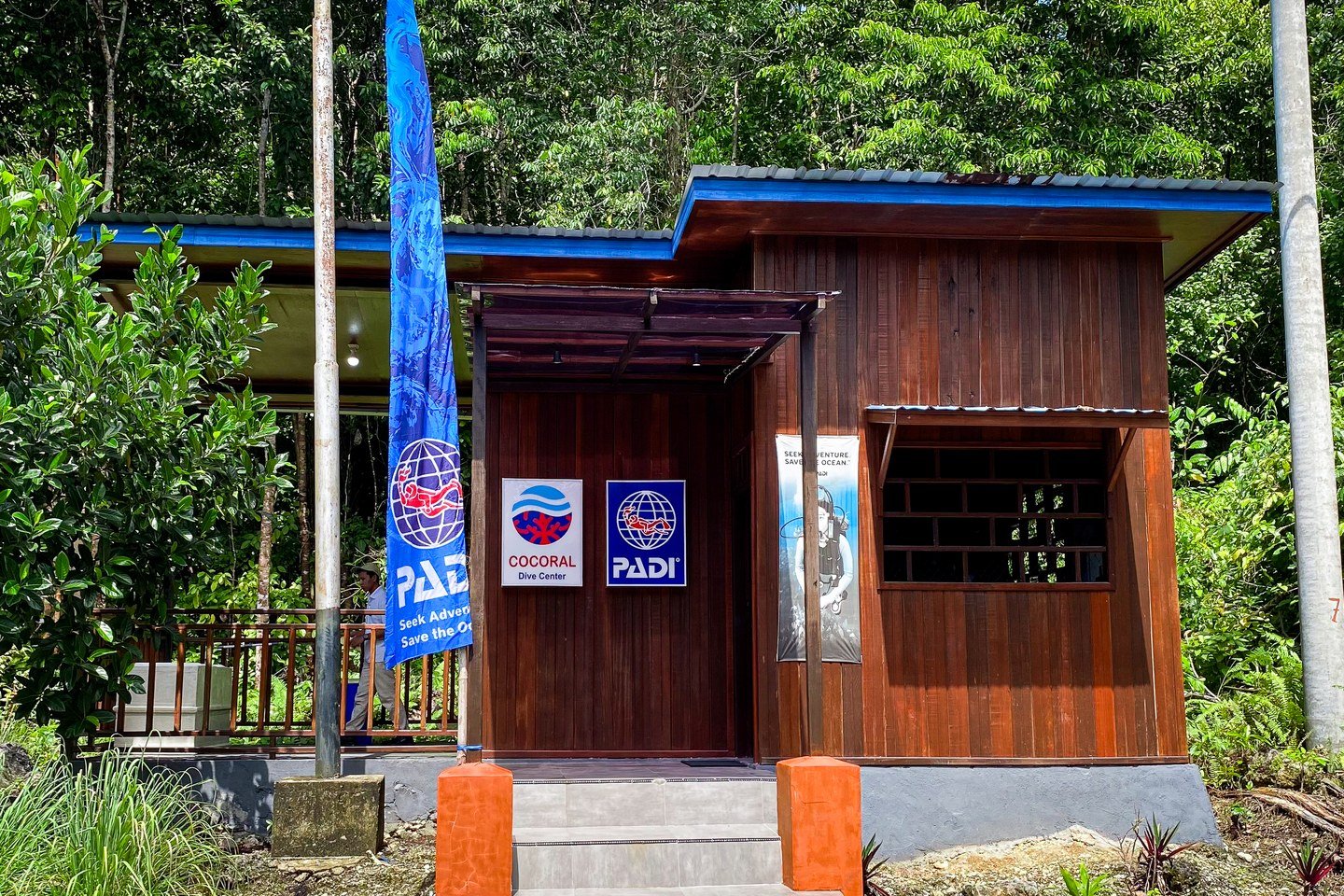 Cocoral Dive Center at Arasatu surrounded by Maratua's tropical forest.