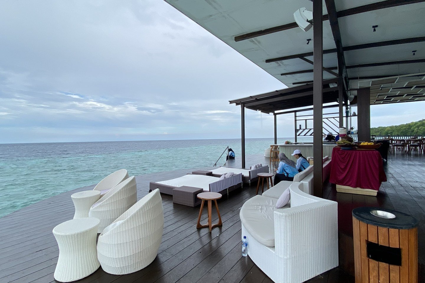 Open-air deck at Samamea Floating Restaurant above the water at Arasatu.