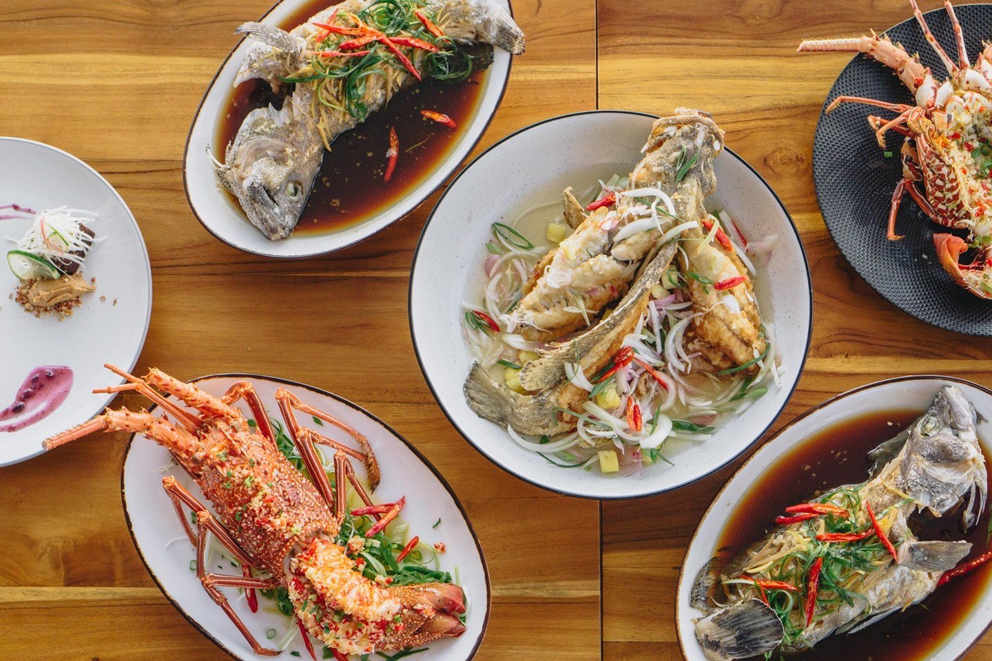 A selection of dishes prepared for a meal at Samamea Floating Restaurant.